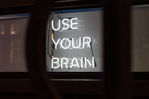 neon sign: use your brain
