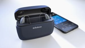 Beltone hearing aids in case next to cellphone