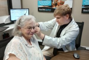 Margaret Rose being fitted for a hearing aid