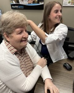 Joanne Dixon of Bracebridge receiving a hearing aid